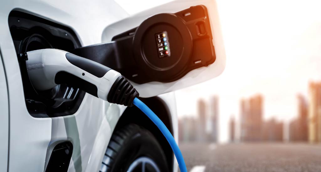 Electric vehicle charging station in a city.